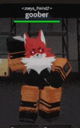 a red and white fox is standing in front of a screen that says goober