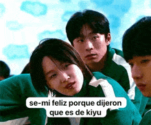 a group of people are playing a game called squid game and a woman is looking at the camera .