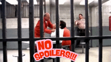 a man in a jail cell with the words " no spoilers " on the bottom