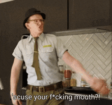a man in a hat and tie says scuse your fucking mouth
