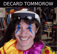 a man in a clown costume is wearing a virtual reality headset and smiling