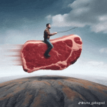 a man is riding a large piece of meat flying through the air