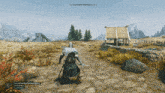 a video game shows a man holding a sword