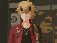 a man with horns on his head is wearing a red and black jacket