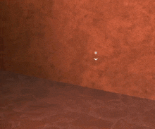 a video game is being played in a dark hallway with a red light on the floor .