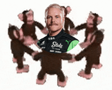 a man with a mustache is surrounded by pink monkeys and has a shirt that says stake on it