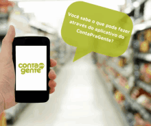 a hand is holding a cell phone with conta pro gente on the screen