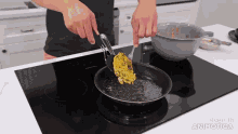 a person is cooking food on a stove and the words made in animatica are on the bottom of the screen