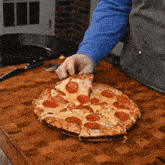 Grabbing A Slice Of Pizza The Hungry Hussey GIF - Grabbing A Slice Of Pizza The Hungry Hussey Melty Cheese Pizza GIFs