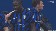 a group of soccer players wearing shirts that say betsson sport