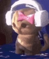 a dog wearing headphones and a pink bow tie is dancing .