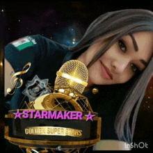 a woman stands in front of a trophy that says starmaker
