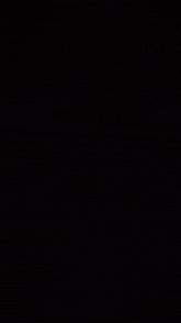 a computer generated image of a purple and white swirl on a black background
