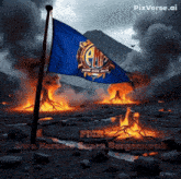 a blue flag is flying in front of a burning mountain