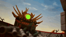 a statue with a green light in the middle