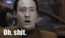 a man from star trek is making a funny face and saying oh shit .