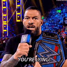 Roman Reigns Wwe Universal Champion GIF - Roman Reigns Wwe Universal Champion Youre Lying GIFs