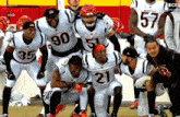 a group of bengals players posing for a photo