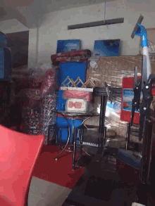 a room filled with lots of boxes including one that says ' pepsi '