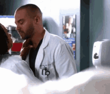 a man in a lab coat with the number 18 on the front