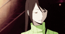 a girl with long hair and a green turtleneck sweater
