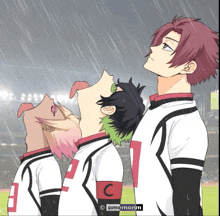 a drawing of three soccer players with the letter c on their arm
