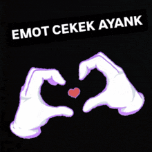 a picture of two hands making a heart with the words emoti cekek ayank above it