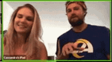 a man and a woman are talking on a video call .