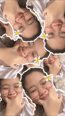 a girl wearing glasses and a flower on her nose