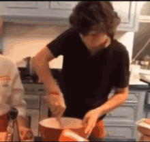 Harry Styles One Direction GIF - Harry Styles One Direction Cooking GIFs