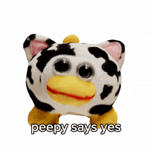a stuffed animal with the words peepy says yes written on it