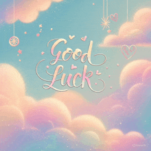 a blue sky with pink clouds and the words good luck written on it