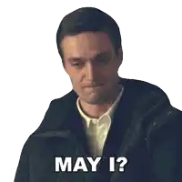 a man in a black jacket says may i ?