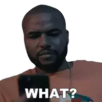 a man with a beard is looking at his cell phone and says what