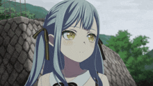 a girl with blue hair and yellow eyes is looking at something