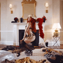 a woman is dancing in front of a fireplace in a room