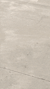 a skateboarder is doing a trick in a skate park