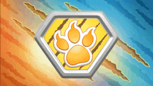a paw print is on a yellow and silver badge
