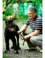 a man is kneeling down next to a large black dog with the date 13.10.31 on the bottom