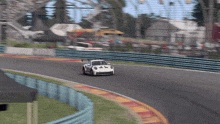 a white race car with the number 44 on the front