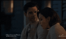 a man and a woman are sitting next to each other in a hallmark movie called when calls the heart