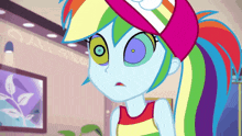 rainbow dash from my little pony equestria girls is wearing a hat