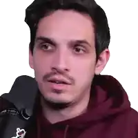 a close up of a man 's face with a hoodie that says ' fox ' on it