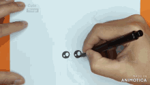 a person is drawing on a piece of paper with the words draw cute things on the bottom