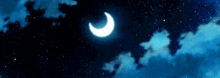 a crescent moon in the night sky with clouds