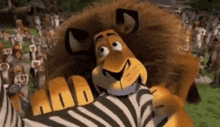 a cartoon lion is holding a zebra in his paws .