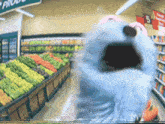 a blurry picture of a grocery store with a sign that says produce on it