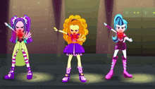 three cartoon girls are standing next to each other in a dark room