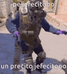 a man in a gas mask is dancing with the words pe jefecitooo un precto jefecitooo below him