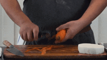 Peeling Carrot Two Plaid Aprons GIF